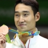 하늘에 바친 김정환의 동메달