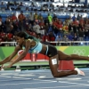 밀러 육상 다이빙 신기술? 여자 400m 결승서 슬라이딩 골인해 金
