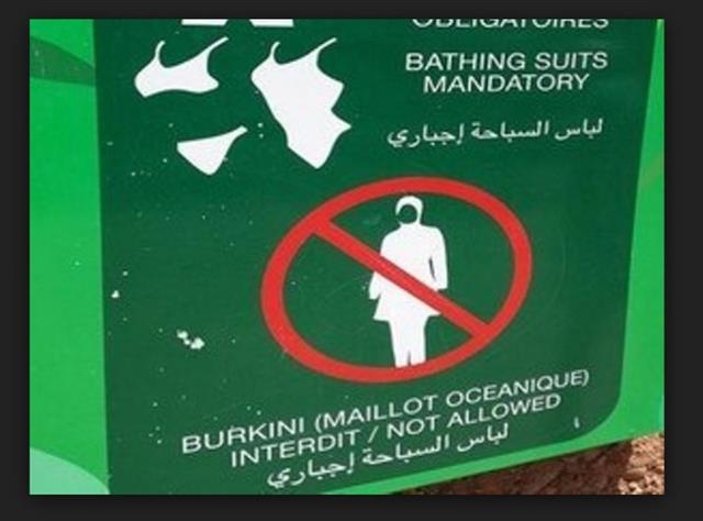 모로코 마라케시의 한 수영장에 부르키니 착용 금지 표지판이 세워져 있다. 모로코월드뉴스 캡처
