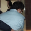 [서울포토] ‘최순실 지원 의혹’ 김종 전 차관, 조사 받으러 가는 뒷모습