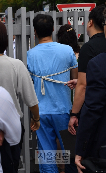 민방위 사이렌에… 법원길 막힌 피의자