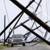 [포토] 허리케인 ‘하비’가 지나간 자리…쓰러질 듯 전봇대가 만든 터널