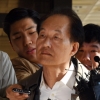[서울포토] 굳은 표정으로 검찰 출석하는 이우용 전 MBC 라디오 본부장