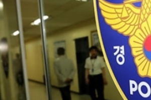 분홍 꽃무늬 옷에 덜미 잡힌 60대 살해범 여성