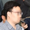 [포토] ‘김성태 폭행범’ 김모씨, 검찰 조사