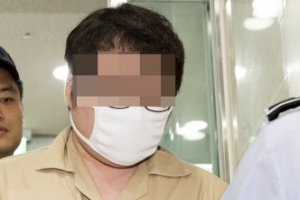 [포토] ‘드루킹 공범’ 둘리 우모씨, 특검 사무실 출석