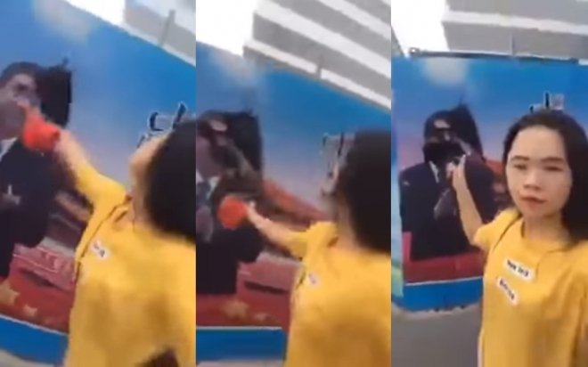 지난 4일 중국 상하이에서 한 여성이 선전간판에 담긴 시진핑 중국 국가주석의 얼굴에 먹물을 뿌리고 이를 촬영해 소셜미디어에 공유했다. 2018.7.17