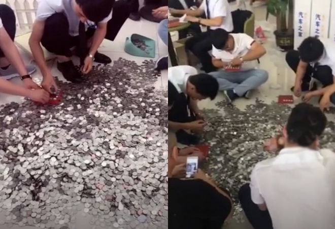 신차 구입비용으로 66개의 가방에 동전을 가득 담아 지불한 중국 남성의 동전을 세는 직원 모습(유튜브 영상 캡처)