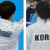 유니폼에 테이프 덕지덕지… KOREA 먹칠한 수영연맹