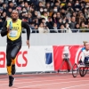 도쿄올림픽 주경기장 첫 총성… 볼트가 번쩍였다