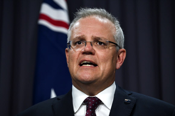 Australian Prime Minister Scott Morrison speaks during a press conference on the governments‘ bushfire response at Parliament House in Canberra
