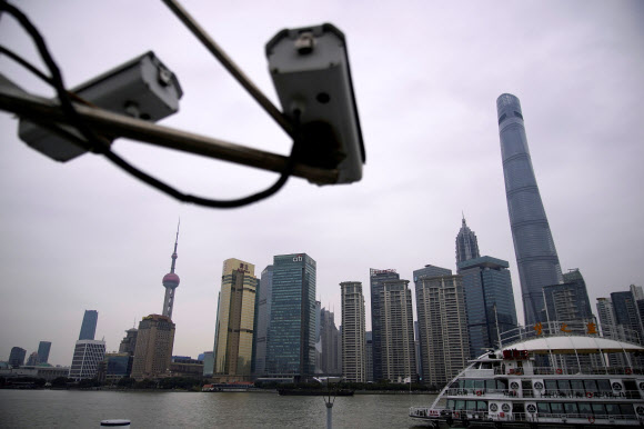 FILE PHOTO: Surveillance cameras are seen at Lujiazui financial district of Pudong