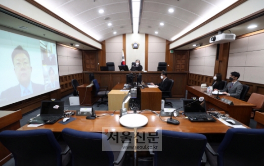 [서울포토] 코로나19 여파...서울고등법원 원격재판 시행