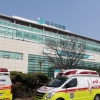 구급차 운전자에 침 뱉은 20대 코로나19 확진자 불구속 기소