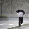 [서울포토]쏟아지는 폭풍우에 발걸음 재촉하는 시민