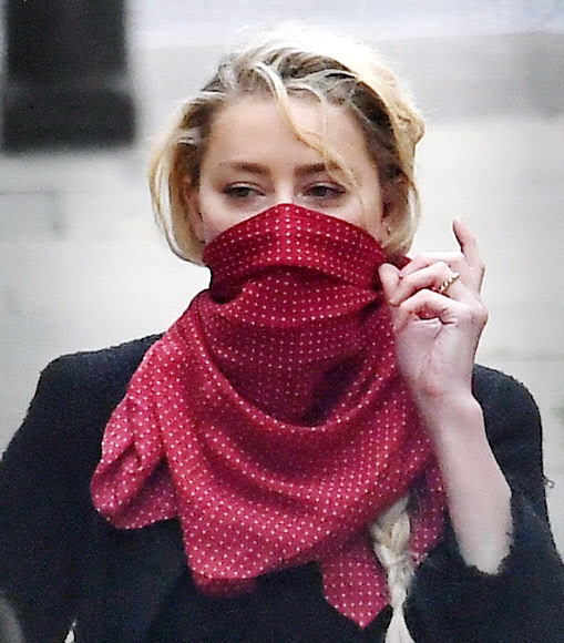 헐리우드 스타 앰버 허드가 13일(현지시간) 영국 런던 고등법원서 열린 명예훼손 소송 재판에 출석하고 있다. EPA 연합뉴스