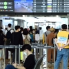 [서울포토]여행객들로 붐비는 김포공항