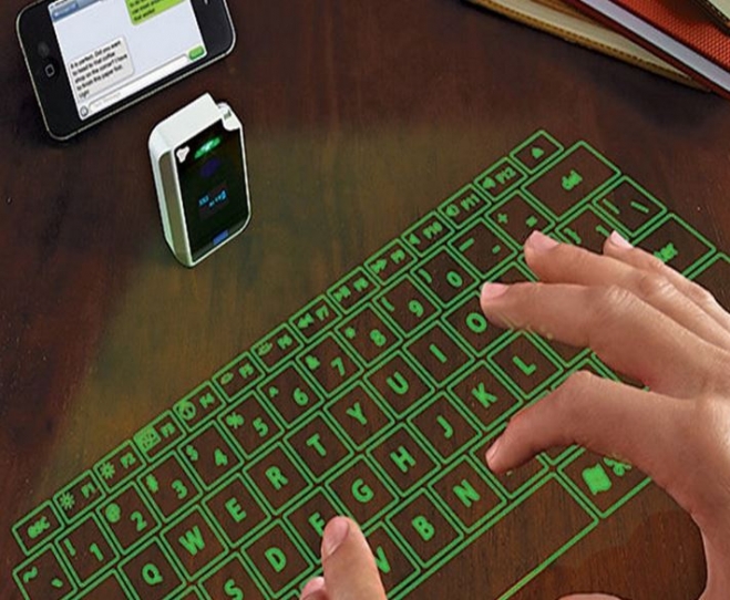 특허청이 신기술 개발 확대에 맞춰 공간상에 보여지는 화상디자인도 보호하는 내용의 디자인보호법 개정을 추진키로 했다. 사진은 가상 키보드. 특허정 제공