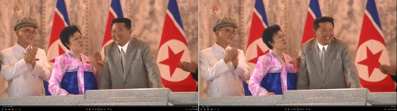 북한 김정은에게 아양 떠는 리춘히 아나운서 한복을 입은 리춘히 아나운서가 야회를 지켜보던 도중 웃으며 김정은 국무위원장의 어깨에 손을 대고 있다. 조용원 노동당 조직비서도 이를 바라보며 웃고 있다. 조선중앙TV 화면 2021.9.9