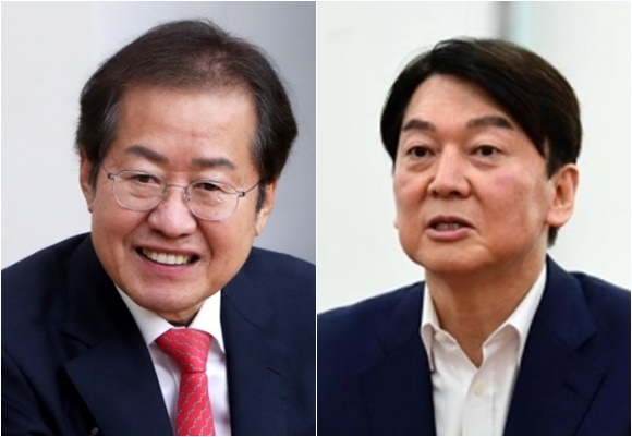 홍준표(왼쪽) 국민의힘 의원, 안철수 국민의당 대선후보 연합뉴스