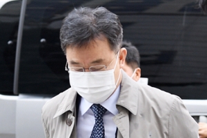 [서울포토] ‘구속 기로’ 고개숙인 김만배