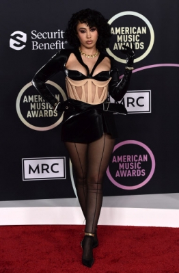 Kali Uchis arrives at the American Music Awards on Sunday, Nov. 21, 2021, at Microsoft Theater in Los Angeles. (Photo by Jordan Strauss/Invision/AP)