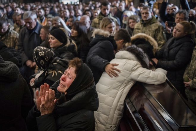 Um funeral conjunto para soldados ucranianos mortos em um ataque com mísseis do exército russo na base de Yavorio em Lviv, na Ucrânia.  14/03/2022 AFP Yonhap News