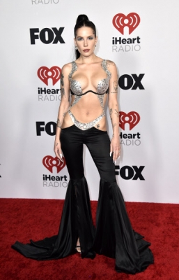 Halsey arrives at the iHeartRadio Music Awards on Tuesday, March 22, 2022, at the Shrine Auditorium in Los Angeles. (Photo by Jordan Strauss/Invision/AP)