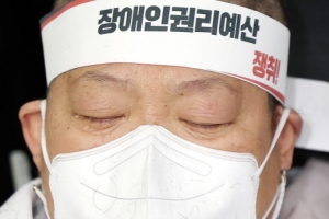 전장연, 지하철 시위 대신 ‘삭발 투쟁’…이준석 “사과 안 한다”