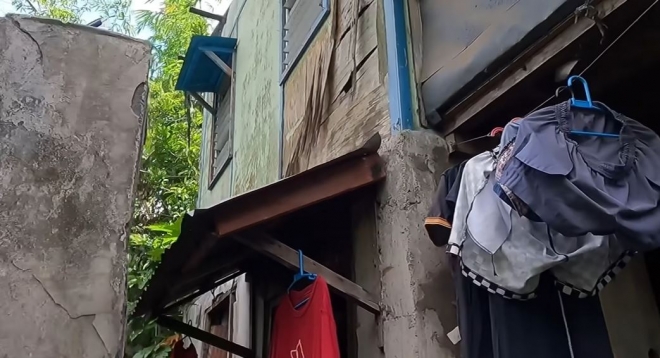 빈민촌에서 생계를 이어가고 있는 코피노 가정