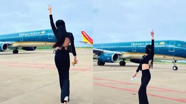 지난달 한 베트남 여성이 푸꾸옥 공항에서 항공기가 이동하는 활주로에 무단으로 침입해 춤추는 동영상을 촬영했다. tuoitreTV