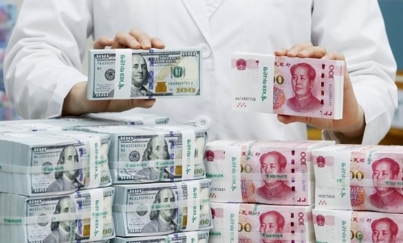 미국 달러화와 중국 위안화. 연합뉴스
