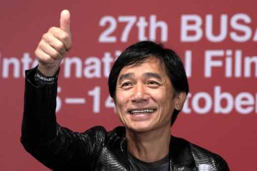 Hong Kong actor Tony Leung gestures during his press conference at the 27th Busan International Film Festival (BIFF) in Busan, South Korea, Thursday, Oct. 6, 2022. AP 연합뉴스