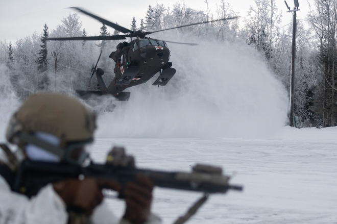 Engineers from the US Air Force Special Operations Command's 24th Special Tactics Wing conduct escort training for an HH-60M Black Hawk belonging to the Alaska National Guard (ANG) at Elmendorf-Richardson Base, Alaska.  2023.1.23 US Air Force