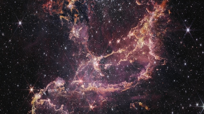 제임스웹우주망원경이 관측한 소마젤란은하의 NGC346 성단. 소마젤란은하에 있는 항성(별) 주변에도 행성이 형성되는 데 필요한 원소들이 충분하다는 점을 새로 발견했다. NASA 제공