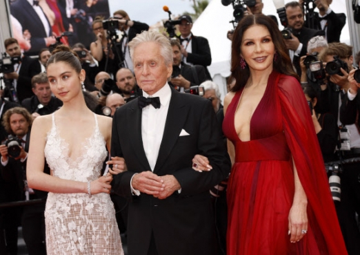 Carys Zeta Douglas, from left, Michael Douglas and Catherine Zeta-Jones pose for photographers upon arrival at the opening ceremony and the premiere of the film ‘Jeanne du Barry’ at the 76th international film festival, Cannes, southern France, Tuesday, May 16, 2023. AP 뉴시스