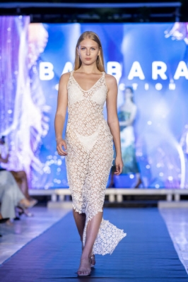 epa10761116 A model presents a creation by BARBARA  during the Summer Fashion Day show of national brands in Chisinau, Moldova, late 21 July 2023.  EPA 연합뉴스