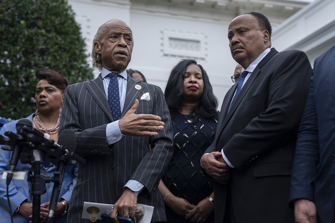 The Rev. Al Sharpton, left, stands with Martin Luther King III, right, Bernice King, back left, and Arndrea Waters King as he speaks to reporters outside the West Wing following a meeting with President Joe Biden and Vice President Kamala Harris at the White House, Monday, Aug. 28, 2023, in Washington. (AP Photo/Manuel Balce Ceneta)