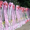 국회 앞 늘어선 이재명 취임 1주년 축하 화환 [서울포토]