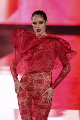 Coco Rocha wears a creation for the L‘Oreal Spring/Summer 2024 womenswear fashion collection presented Sunday, Oct. 1, 2023 in Paris. AP