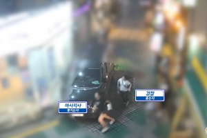 퇴폐마사지女 잡은 여경… 10분간 추격전·몸싸움 끝에