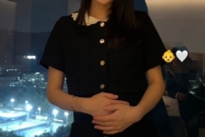 예비엄마 손연재, 임신한 배 소중히 ‘요정 미소’