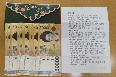 [단독]“15년 전 책값 받아달라”… 100만원·손편지 건넨 교보문고 고객