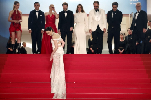 Director Magnus von Horn, cast members Vic Carmen Sonne, Trine Dyrholm, Besir Zeciri, Tessa Hoder, producers Malene Blenkov and Mariusz Wlodarski and Cannes Film Festival General Delegate Thierry Fremaux pose on the red carpet during arrivals for the screening of the film “The Girl with the Needle” (Pigen med nalen - La jeune femme a l‘aiguille) in competition at the 77th Cannes Film Festival in Cannes, France, May 15, 2024. REUTERS 연합뉴스