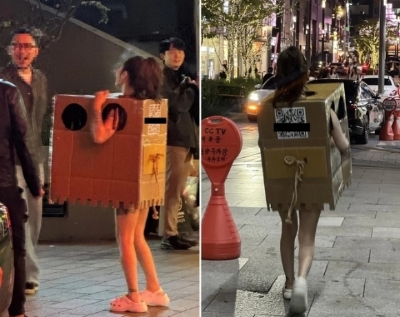 ‘압구정 박스녀’로 불린 여성 A씨가 서울 강남 한복판에서 행인들에게 박스 안으로 손을 넣어 자신의 가슴을 만지게 한 ‘이벤트’를 벌여 논란이 됐다. 온라인 커뮤니티 ‘에펨코리아’ 캡처