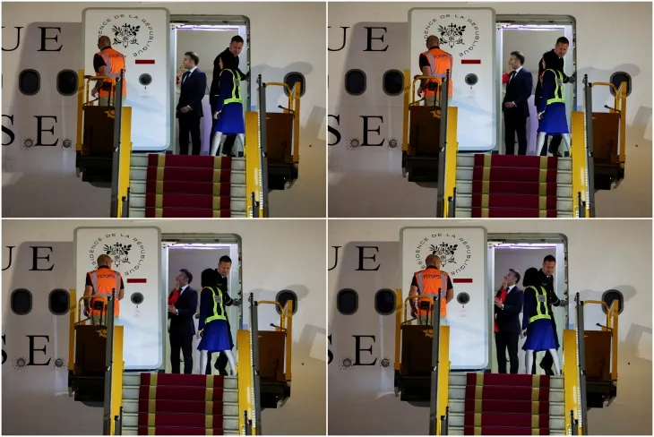 25일 에마뉘엘 마크롱 프랑스 대통령의 얼굴을 브리지트 여사가 대통령 전용기 안에서 밀고 있다. 로이터 연합뉴스