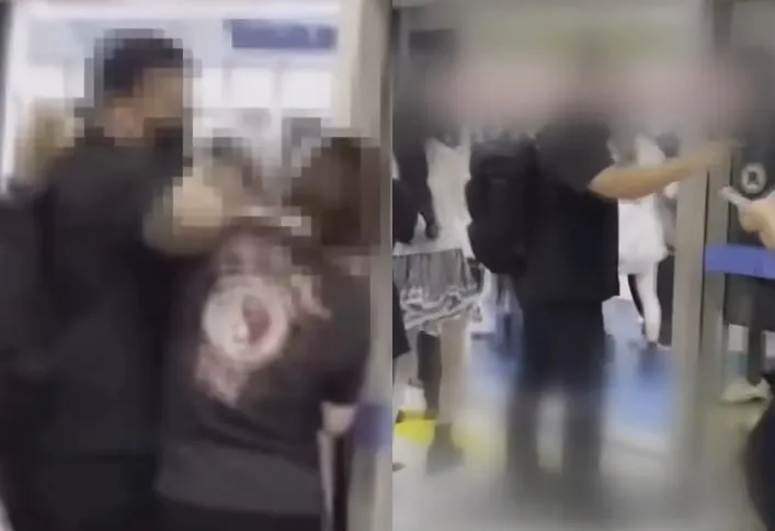 지난 8일 인천국제공항 탑승동으로 향하는 셔틀트레인 앞에서 걸그룹 ‘하츠투하츠’의 경호원이 한 20대 여성을 팔꿈치로 밀고 손가락질을 하고 있다. 자료 : JTBC 사건반장