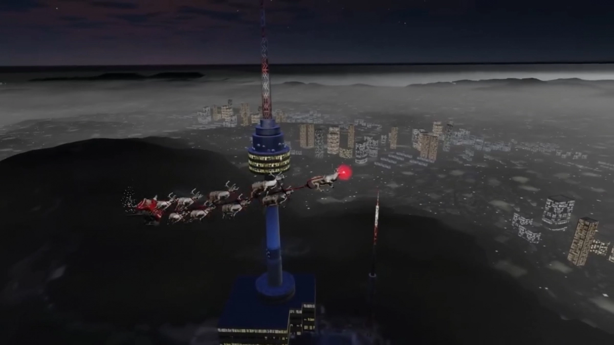 북미항공우주방위사령부(NORAD)가 24일 올린 ‘산타추적’ 페이스북 영상에서 산타가 썰매를 타고 서울 남산타워 상공을 지나고 있다. NORAD 산타추적 페이스북 캡처