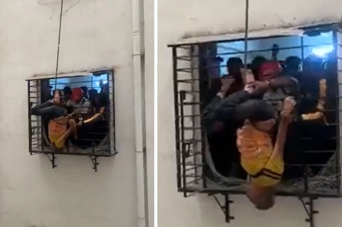 인도에서 한 50대 남성이 10층 아파트 창가에서 낮잠을 자다 추락했다가 다리가 8층 창문에 걸리면서 목숨을 건졌다. 엑스 캡처