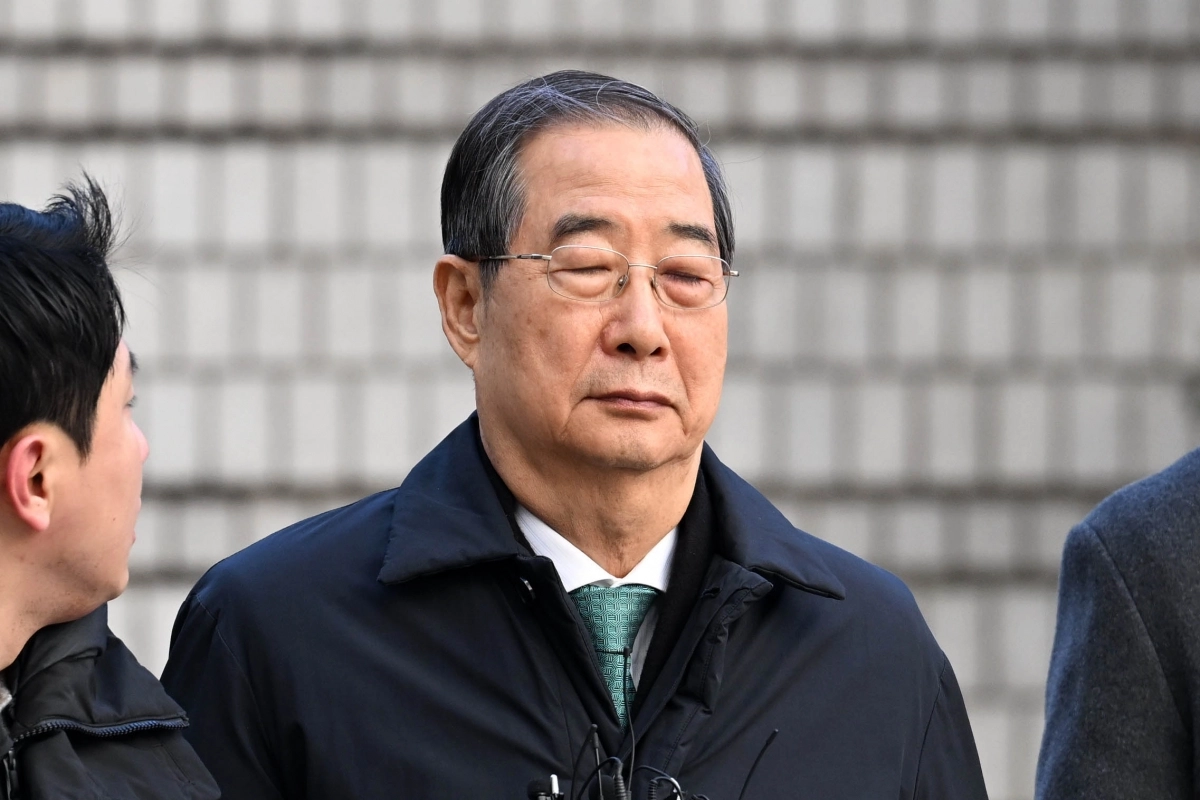 내란 우두머리 방조 혐의를 받는 한덕수 전 국무총리가 21일 서울중앙지법에서 열린 1심 선고 공판에 출석하고 있다. 2026.1.21 홍윤기 기자